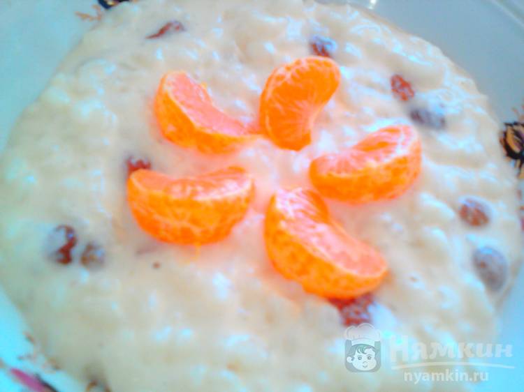 Каша рисовая с изюмом и мандарином в мультиварке - фото шаг 4