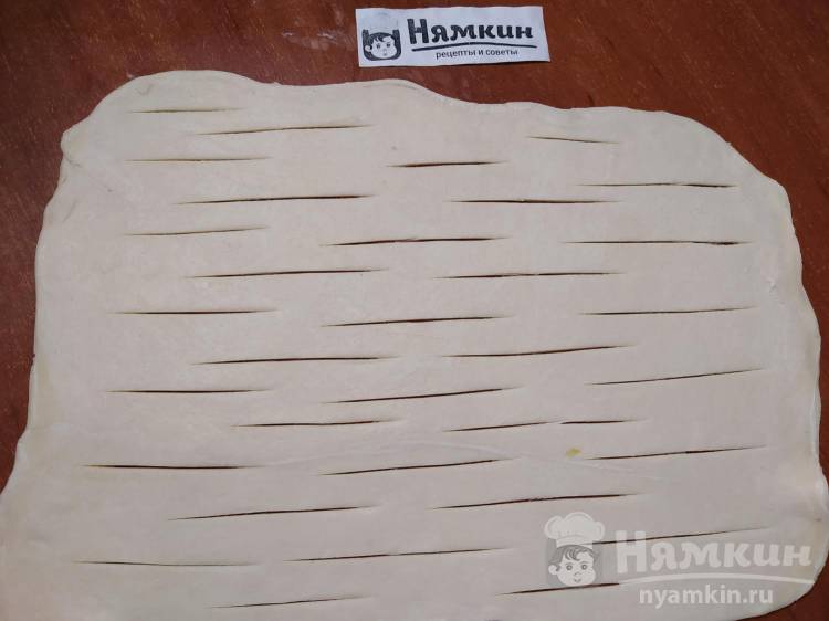 Пирог с капустой и консервированной рыбой из слоёного теста - фото шаг 11