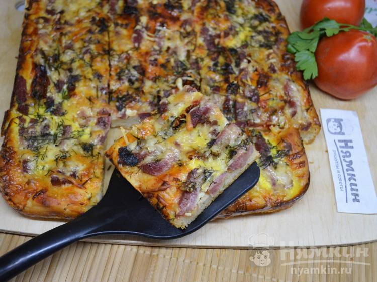 Пицца с вялеными помидорами и копченым мясом: пикантная и вкусная