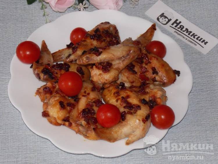 Запеченные куриные крылья с сушеными помидорами в духовке